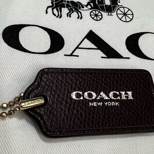 Coach New York Pebbled Leather Bag Tag espresso Gold Chain